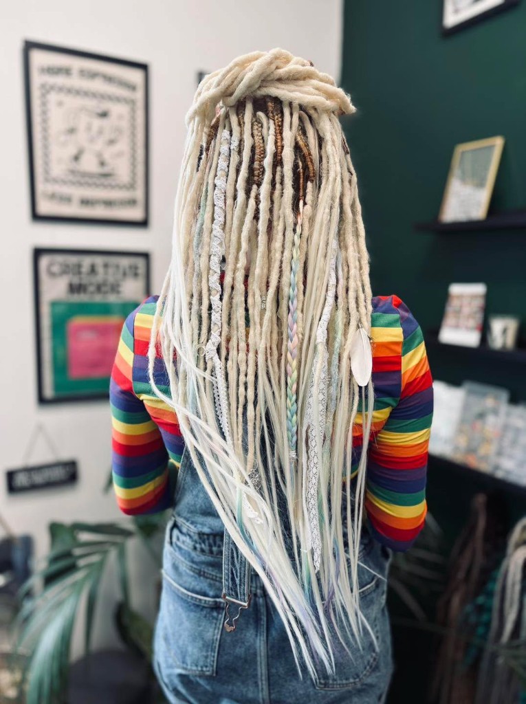 Blonde locs with pink thread