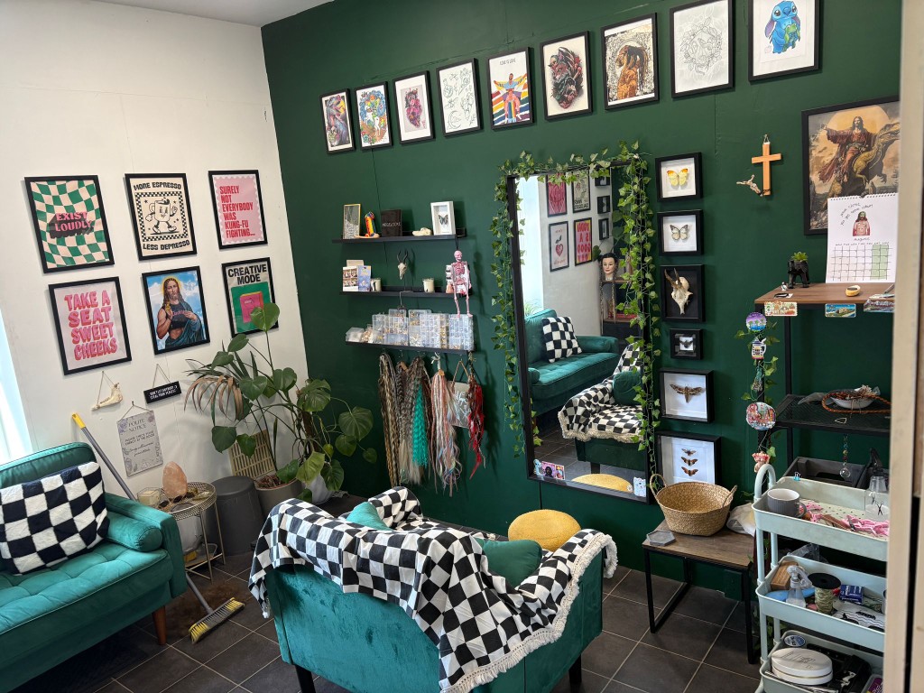MegsLocks studio — checkerboard walls and dreadlock sets